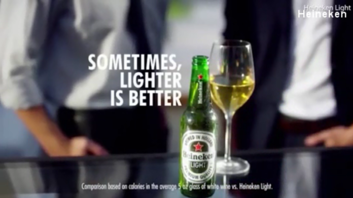 Heineken removes ad after American rapper calls it 'racist'
