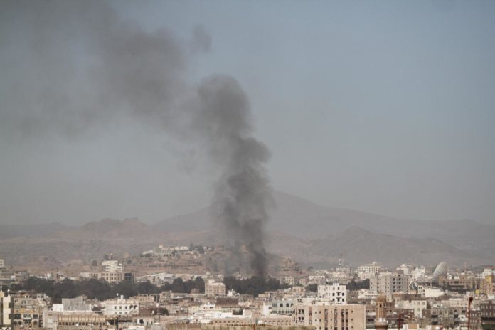 Smoke rises after an airstrike in Sanaa