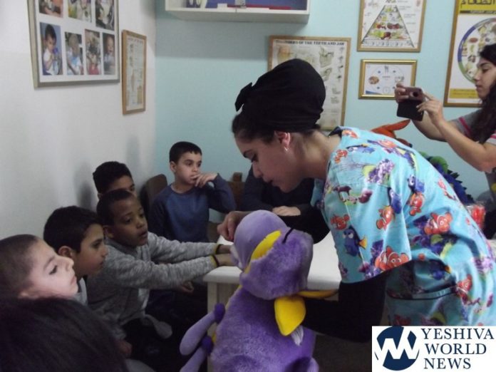 dental hygienist doing workshop with special ed kids