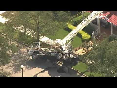 VIDEO: Crane Crashes Through Florida Home; Tears Gash In Roof