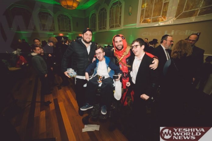 Chai Lifeline staff and clients celebrating