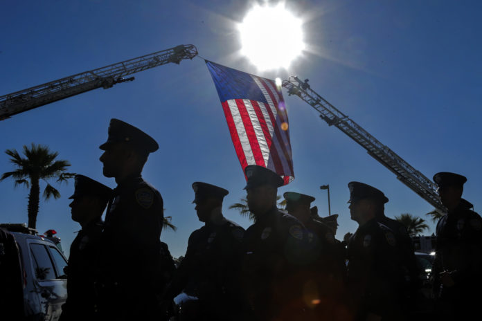 Funeral Held For Police Officers Killed In Line Of Duty During Ambush Attack In Palm Springs, California