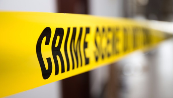 crime-scene-tape-in-building-with-blurred-background-picture-id601144468