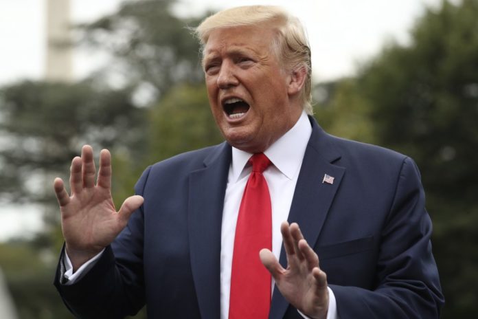 100President Donald Trump speaks to members of the media on the South Lawn of the White House in Washington, Monday, Sept. 9, 2019, before boarding Marine One for a short trip to Andrews Air Force Base, Md., and then on to North Carolina. (AP Photo/Andrew Harnik)0 - 2019-09-09T160708.333