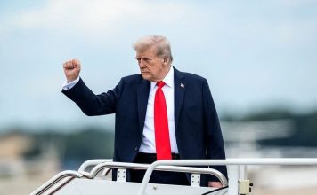 President Donald Trump raises his fist while boarding Air Force One at Joint Base Andrews in Maryland before departing for New York, Sept. 7, 2025. Photo: Daniel Torok / Official White House Photo via Flickr / United States Government Work