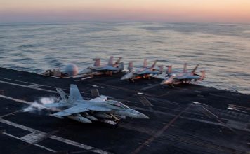 This image provided by U.S. Central Command shows a F/A-18F Super Hornet preparing to make an arrested landing on the USS Abraham Lincoln (CVN 72)) in support of Operation Epic Fury, on Saturday, Feb. 28, 2026. (U.S. Navy via AP)