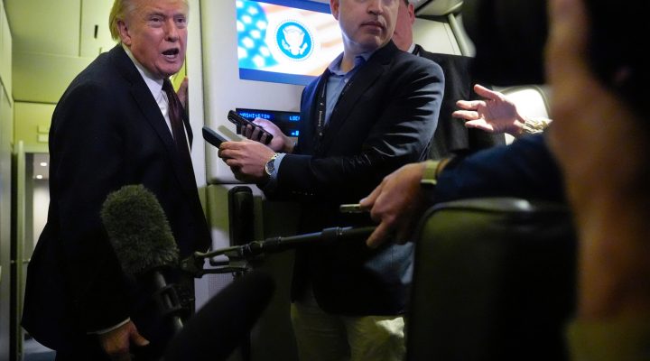 President Donald Trump speaks to reporters aboard Air Force One, Sunday, March 15, 2026, en route from West Palm Beach, Fla. to Joint Base Andrews, Md. (AP Photo/Mark Schiefelbein)