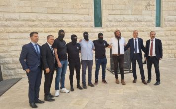 Unit 100 soldiers and their lawyers hold a press conference. Photo: Honenu