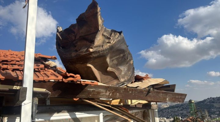 Fire and Rescue teams are currently operating at a scene where a large interception fragment struck a residential building in the Ras al-Amud neighborhood of Jerusalem.