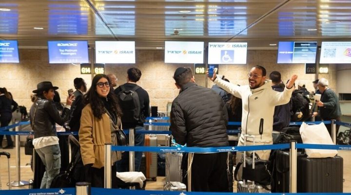 Passengers at Ben Gurion Airport wait for the first flights departing Israel since the start of Operation Roaring Lion. (Israel Airports Authority)