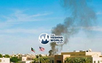 Smoke rises next to the U.S. Embassy in Kuwait.
